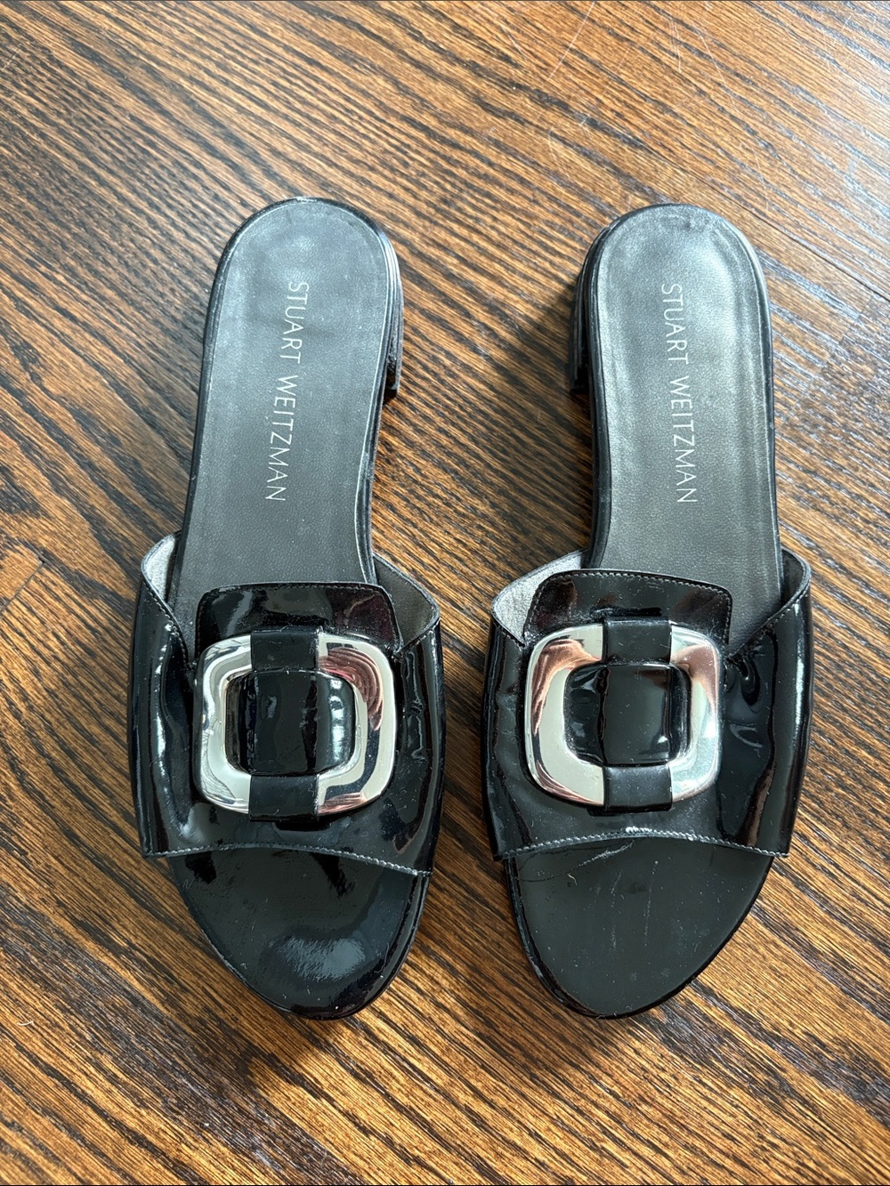 Stuart Weitzman Black Patent Slide Sandals with Silver Buckles